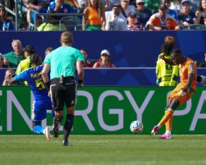 Ivory Coast advances to knockout round in historic World Cup achievement (Photo by: mcall.com)