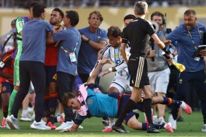 Argentine players, staff suspended for combined 21 matches after World Cup final incident (Photo by: nyt.com)